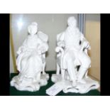 A pair of 19cm high Victorian figures of seated ge