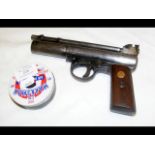 A Webley & Scott air pistol with pellets