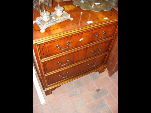 A reproduction Georgian style chest of three long