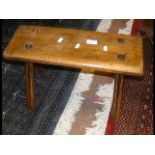 A primitive antique stool