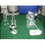 Five boxed Swarovski ornaments, including a Teddy