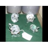 Four boxed Swarovski animals, including elephant