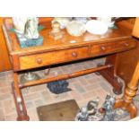 A Victorian mahogany desk with two drawers to the