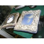 An Art Nouveau silver photo frame and one other