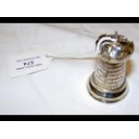 A novelty silver pepperette as castle chess piece