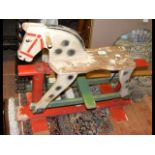 A child's miniature rocking horse