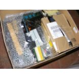 A box containing model railway parts