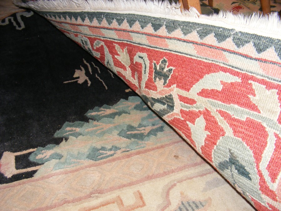 A large Middle Eastern style carpet with geometric - Image 6 of 6