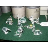 Eight boxed Swarovski animal ornaments, including