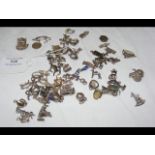 Over 50 silver charms