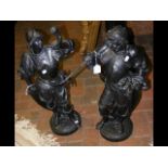 A pair of 70cm high spelter figures of men in armo