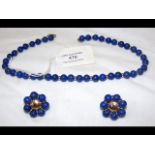 A lapis lazuli necklace with 9ct gold clasp, toget