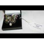 A silver and pearl 'butterfly' brooch