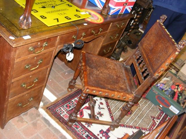 Antique pedestal desk with nine drawers to the fro