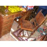 Antique pedestal desk with nine drawers to the fro