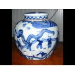 An antique oriental blue and white ginger jar and