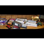 Selection of boxed and unboxed die-cast trucks and