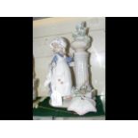 Two large Lladro figures - a girl wearing bonnet and