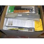 A box containing coach kits and others