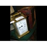 A brass cased carriage clock with alarm - 11.5cm h