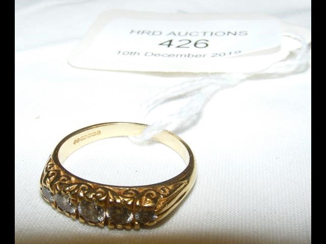 A five stone diamond ring in 18ct gold setting