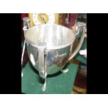 A silver three handled cup - 9cm high