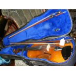 Antique violin with bow in fitted carrying case