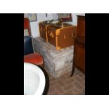 An old storage chest, together with suitcase