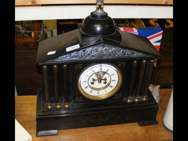 Victorian striking mantel clock with visible escap