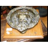 A 26cm antique 'Lion's head' door knocker