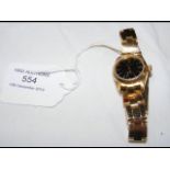 A lady's 18ct gold Rolex Oyster Perpetual wrist wa