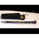 An old three section twelve key rosewood clarinet