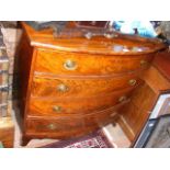 Antique bow front chest of four long graduated dra