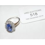 A pale sapphire and diamond ring in 18ct white gol