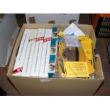 A box containing various model railway kits