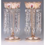 A PAIR OF LATE 19TH CENTURY BOHEMIAN CLEAR GLASS LUSTRES overlay painted with gilt stylised