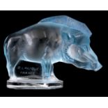 RENÉ LALIQUE. A FROSTED BLUE GLASS 'SANGLIER' CAR MASCOT formed as a wild boar on circular foot,