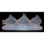 AN EARLY 20TH CENTURY CESERI OPQUE GLASS PAPERWEIGHT depicting three small fish - signed Ceseri