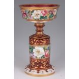 A 19TH CENTURY BOHEMIAN ENAMEL AND GILT WORK RUBY GLASS CENTREPIECE of circular form with faceted