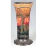 AN EARLY 20th CENTURY MOORCROFT EVENTIDE TRUMPET VASE on Tudric hammered pewter foot 16.5cm high