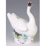A 19th CENTURY MEISSEN SWAN having impressed numbers and cross swords to the underside 31cm high