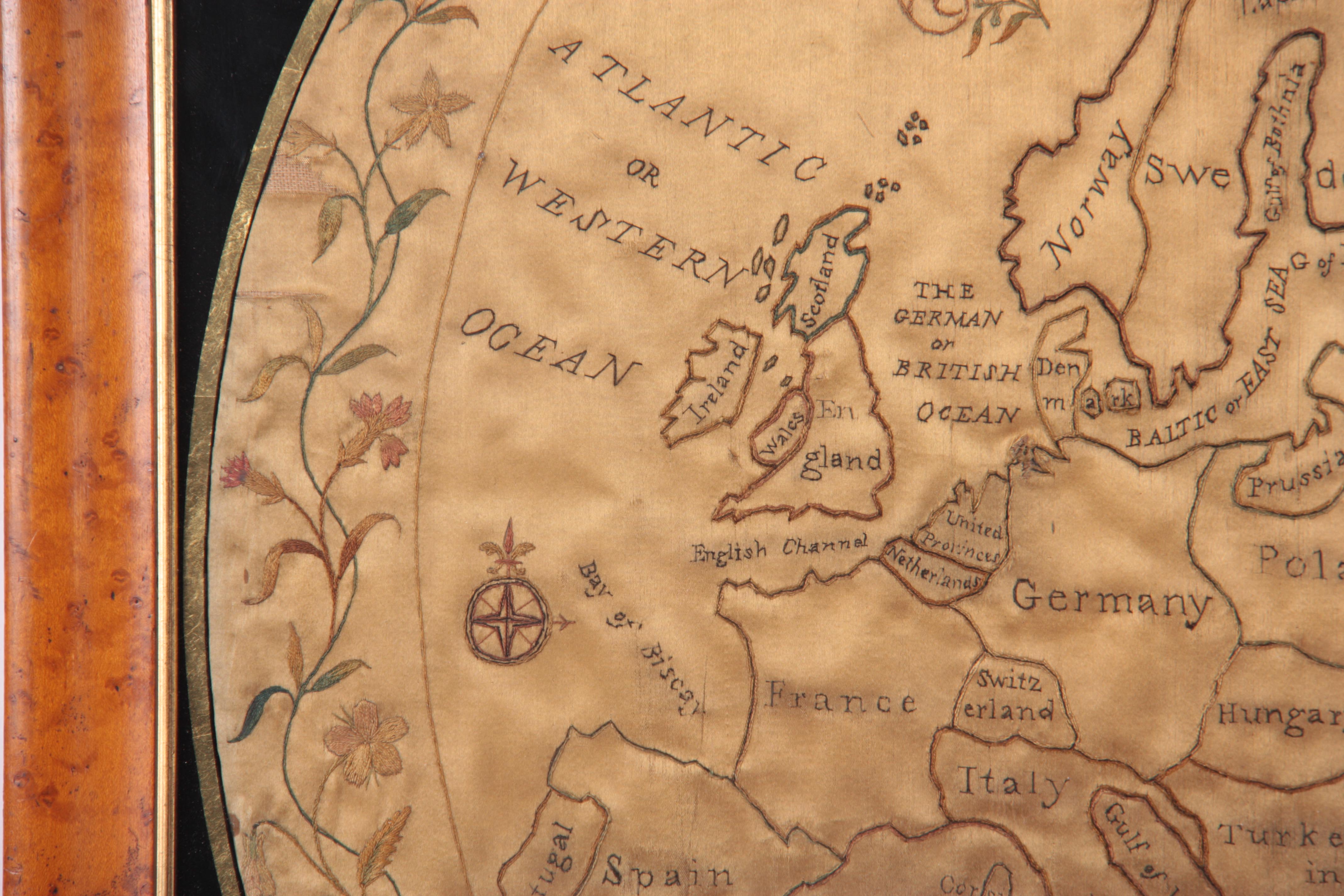 AN EARLY 19TH CENTURY SILKWORK MAP OF EUROPE circa 1800 - in a glazed birds eye maple moulded - Image 3 of 4