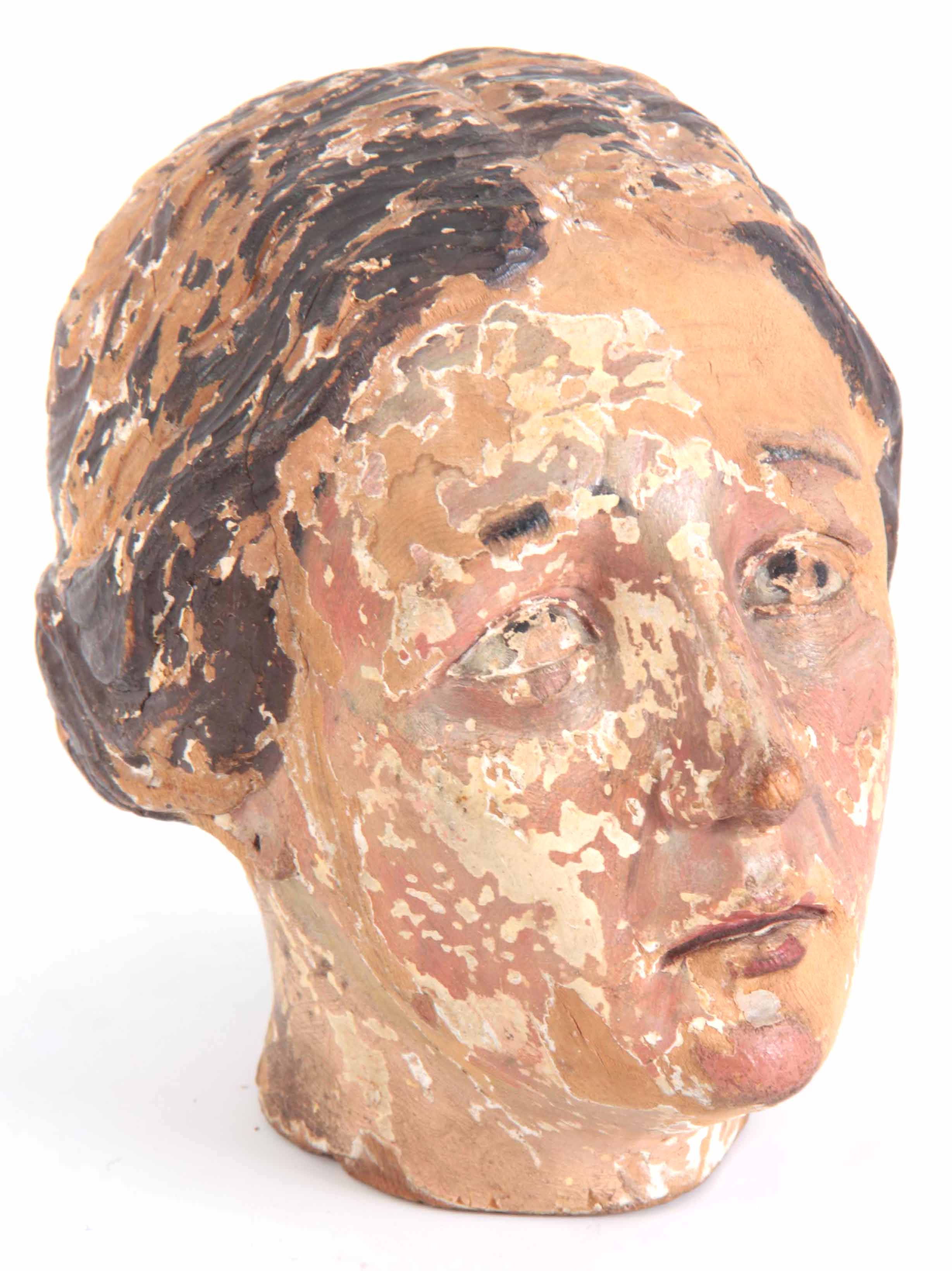 AN EARLY ITALIAN POLYCHROME PAINTED CARVED HEAD OF A FEMALE SAINT – 20cm high 22cm wide