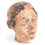 AN EARLY ITALIAN POLYCHROME PAINTED CARVED HEAD OF A FEMALE SAINT – 20cm high 22cm wide