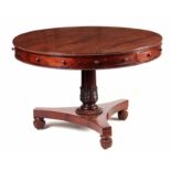 A WILLIAM IV ROSEWOOD DRUM TABLE IN THE MANNER OF GILLOWS the figured top with fitted frieze drawers