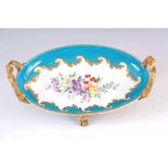 A FINE 19TH CENTURY ORMOLU MOUNTED SEVRES PORCELAIN SHALLOW OVAL DISH on a gilded celestial blue