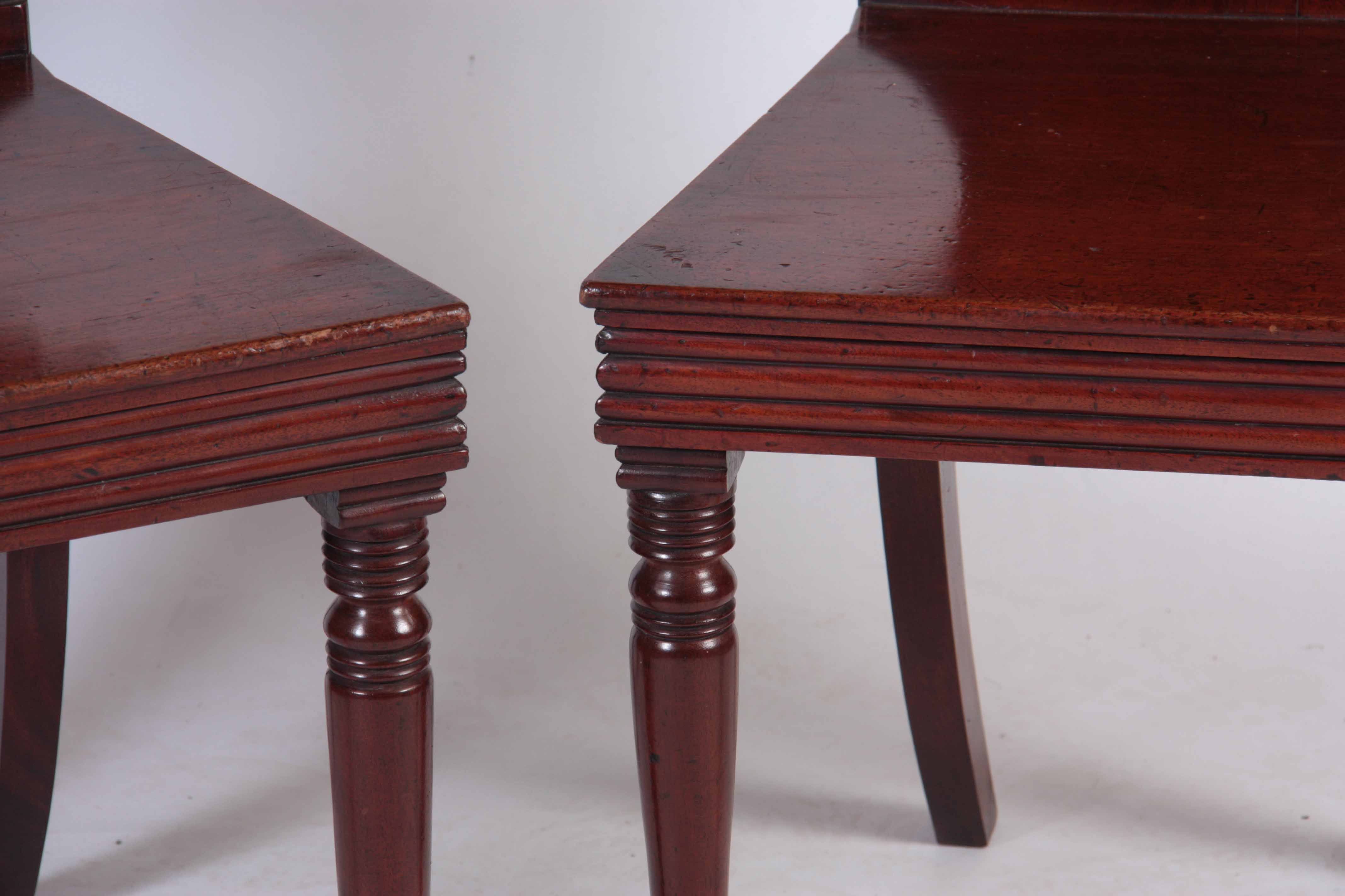 A PAIR OF LATE GEORGIAN MAHOGANY HALL CHAIRS with painted backs reading Castle Howard with coats - Image 5 of 9