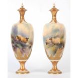 HARRY DAVIS, A FINE PAIR OF ROYAL WORCESTER CABINET VASES of ovoid form with a flared neck, having a
