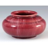 AN EARLY 20TH CENTURY PILKINGTON’S LANCASTRIAN ART POTTERY BOWL with a crystalline flambé red glaze,