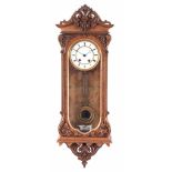 ATT. LENZKIRCH. A LATE 19TH CENTURY GERMAN BURR WALNUT VIENNA STYLE WALL CLOCK having carved